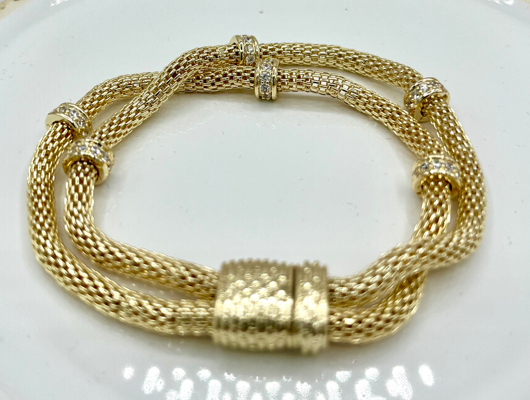 Gold Finish Serpentine Bracelet with Pave Insets